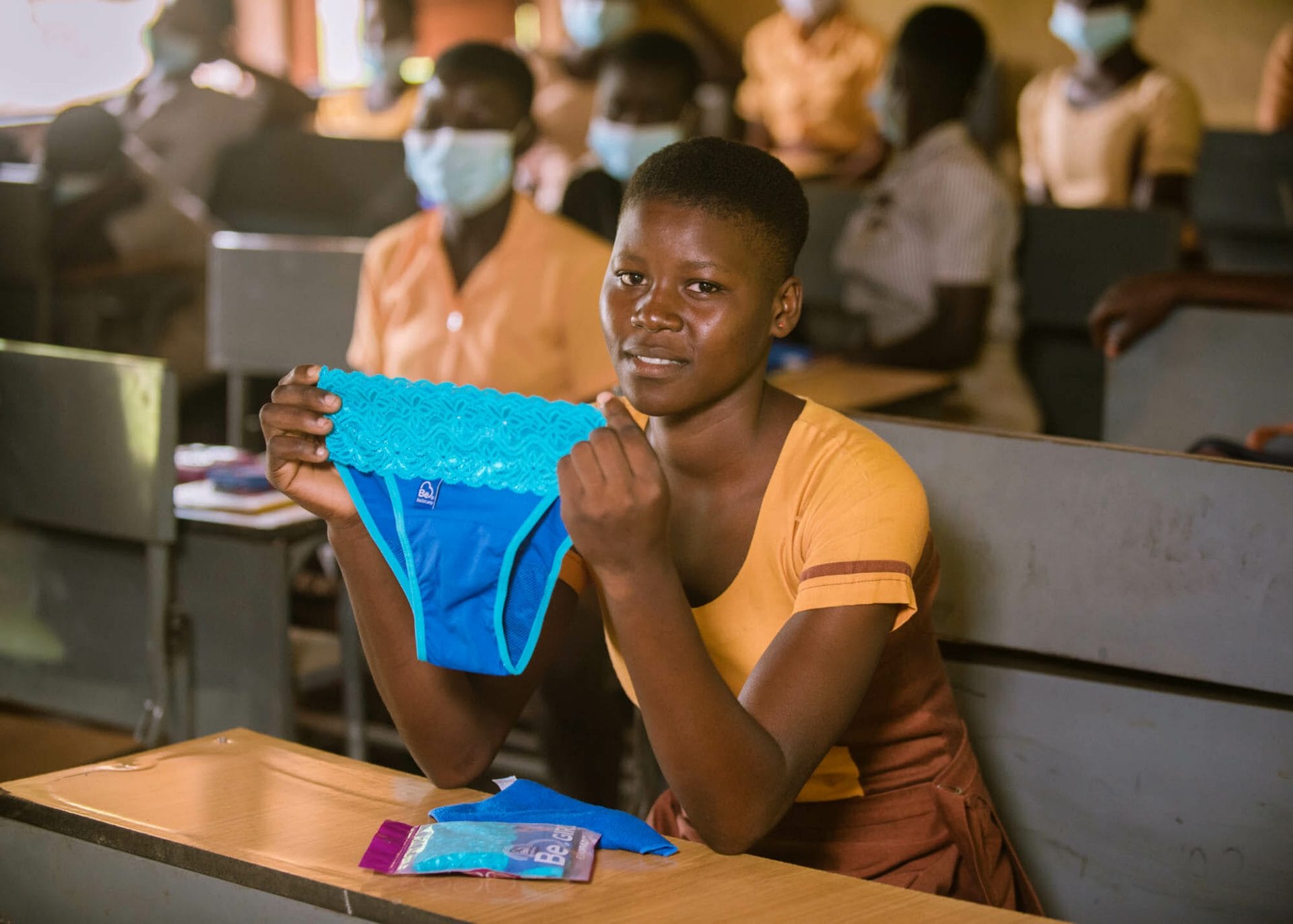 A basic school pupil displaying Be Girl sanitary panty