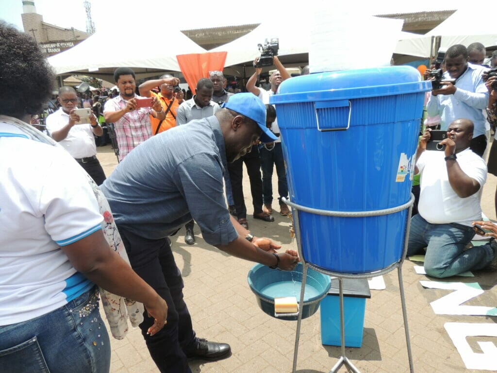 Mr Mohamed Adjei Sowah demonstrates handwashing. 